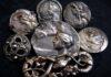 Serpents and Sorceresses—a decadent assortment of antique Art Nouveau brooches and buttons, including interlaced serpents accented with shimmering garnets and marcasite, a fluttering of bats, plus the witchy women who are perfectly content to share their time with either (and perhaps be convinced to tell your fortune while doing so).